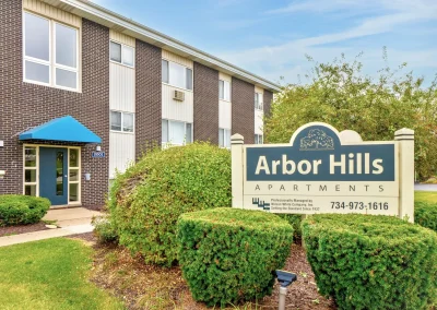 Arbor Hills Apartments monument sign surrounded by landscaping at the community entrance in Ann Arbor, Michigan